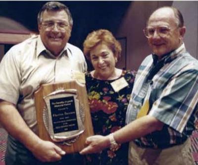 Charlie with his wife Dolores in 1996 as he receives an award from Terry Burcaw of 41 Truss for SETMA’s  "Outstanding Contributions to the Building Component Industry”