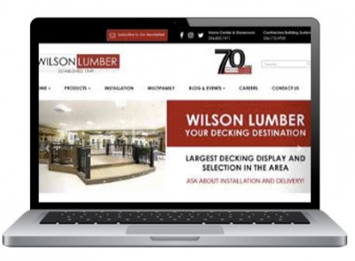 Laptop with Wilson Lumber website on the screen