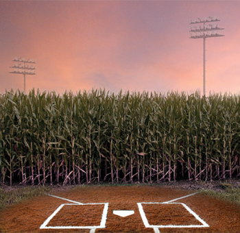 Home plate of a baseball field that's in a cornfield