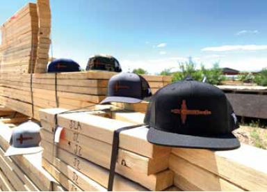Champion Truss hats sitting on stacks for trusses