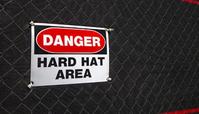 Sign that reads Danger Hard Hat Area