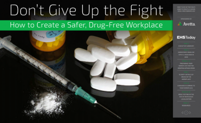 Pill bottles and syringe next to a powdery substance